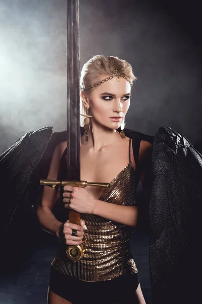 Beautiful Woman Warrior Costume Black Angel Wings Holding Sword Posing — Stock Photo, Image