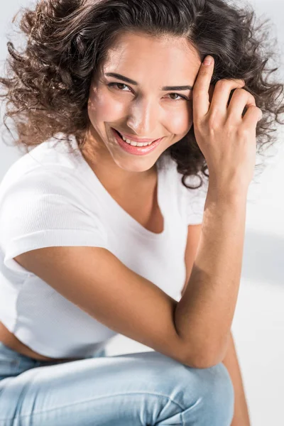 Charming Curly Girl Smiling Touching Hair — Stock Photo, Image