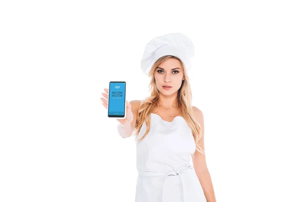 Attractive Blonde Cook Woman Uniform Holding Smartphone Skype App Screen — Stock Photo, Image