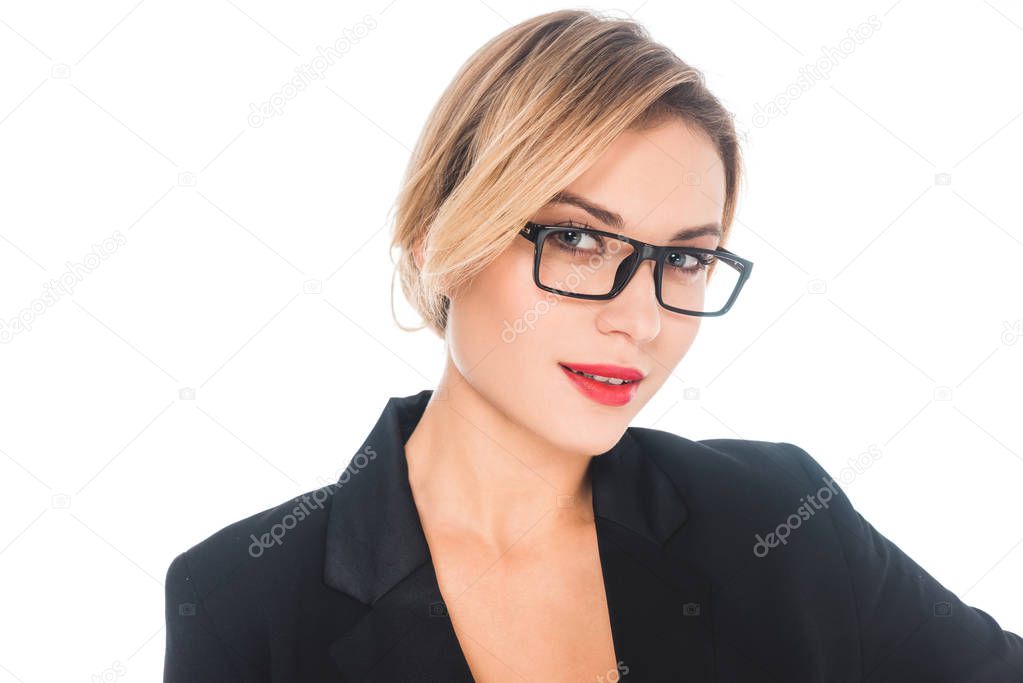 attractive businesswoman in black formal wear and glasses isolated on white