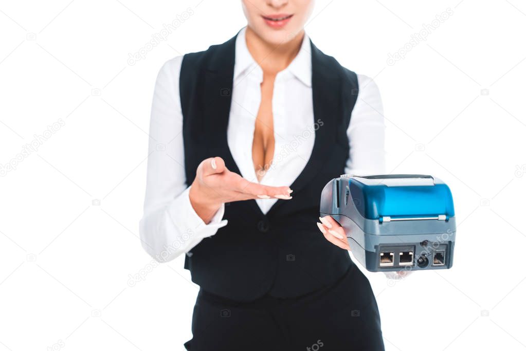 cropped view of waitress in black uniform pointing to terminal with hand isolated on white