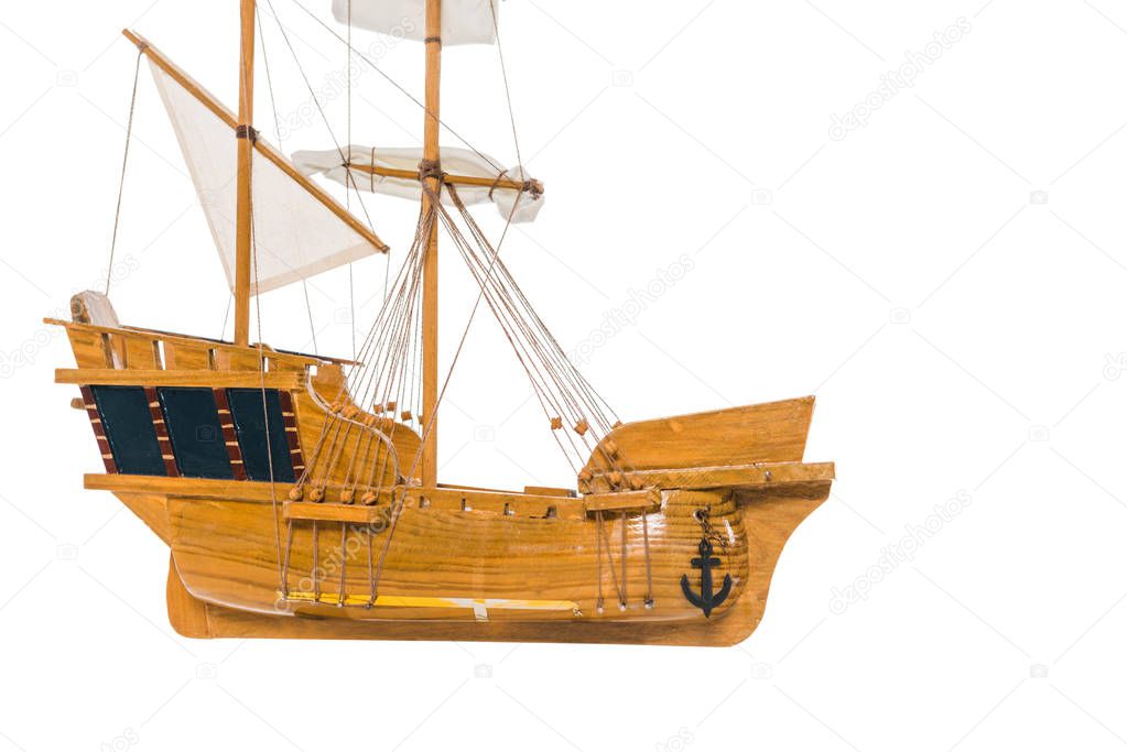 vintage wooden ship model floating in air isolated on white 