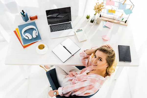 Charming Smiling Girl Checkered Shirt Looking While Sitting Workplace — Stock Photo, Image