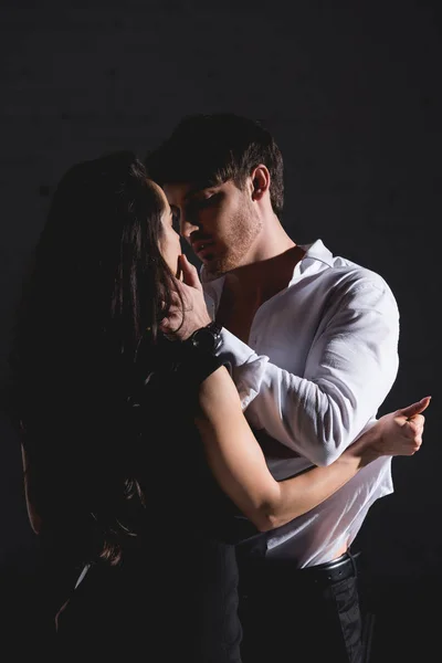 Brunette Woman Black Dress Standing Kissing Undressing Man White Shirt — Stock Photo, Image