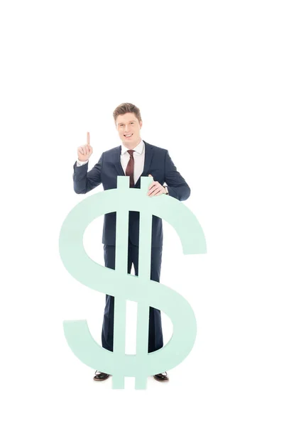 Молодой Улыбающийся Бизнесмен Идеей Указывая Вверх Позируя Большим Знаком Доллара — стоковое фото