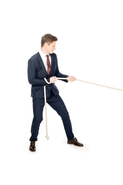 young stylish businessman pulling rope isolated on white