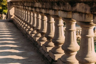 selective focus of balustrade in parc de la ciutadella, barcelona, spain clipart