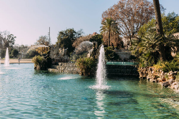 beautiful lake with fountains in ciutadella park, barcelona, spain