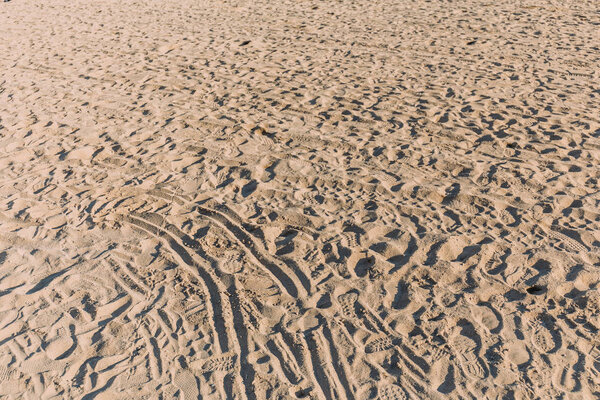 beach sand with different traces, barcelona, spain