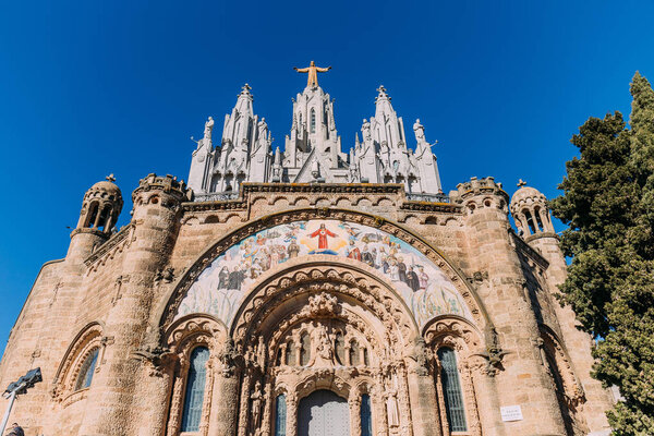 central entrance of temple expiatori del sagrat, barcelona, spain