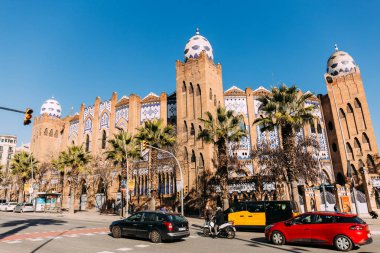 BARCELONA, SPAIN - DECEMBER 28, 2018: busy street with cars and beautiful old building clipart