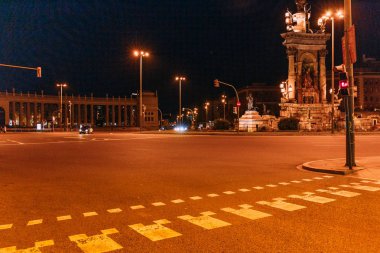 BARCELONA, SPAIN - DECEMBER 28, 2018: night scene of beautiful Plaza de Espana, one the most beautiful landmarks of the city clipart