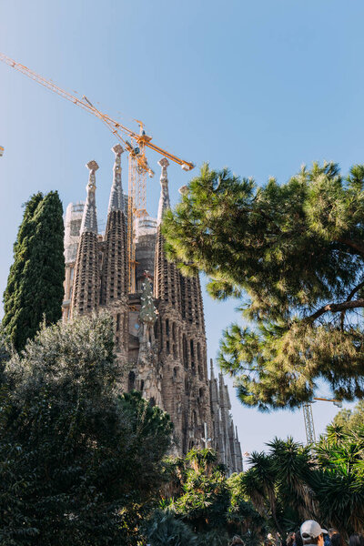 BARCELONA, SPAIN - DECEMBER 28, 2018: selective focus of Temple Expiatori de la Sagrada Familia, one of the most famous buildings of Barcelona, built by Antoni Gaudi