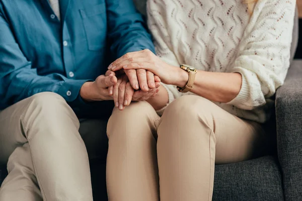 Cropped View Husband Wife Holding Hands While Sitting Home — Stock Photo, Image