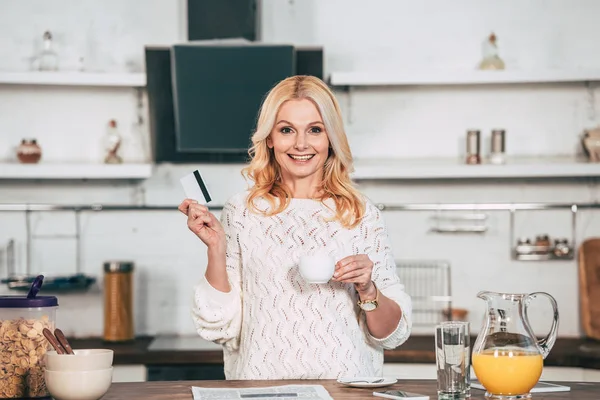 Attractive Blonde Woman Holding Credit Card Cup Hands — Stock Photo, Image