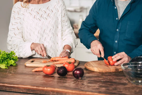 Cropped View Couple Cutting Carrot Tomato Kitchen — Stock Photo, Image