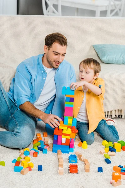 Father Adorable Preschooler Son Playing Colorful Building Blocks Home — Stock Photo, Image