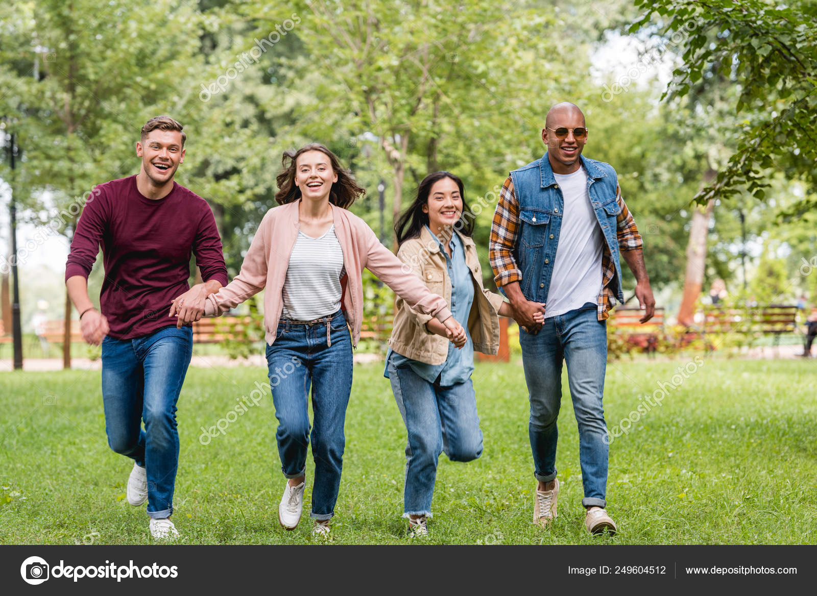 Cheerful Multicultural Friends Holding Hands Running Park — Stock Photo