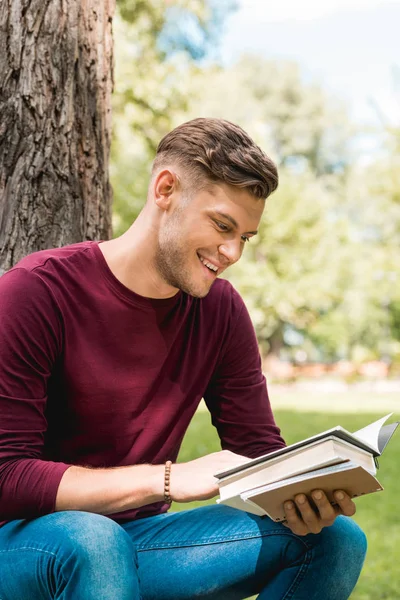 Cheerful Student Reading Book Smiling While Sitting Park — Stock Photo, Image