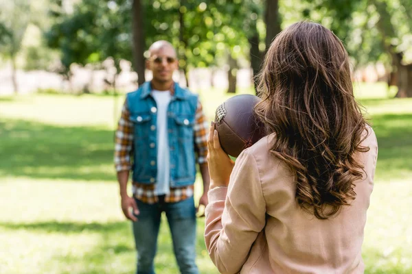 Selective Focus Girl Holding American Football Looking African American Boyfriend — Stock Photo, Image