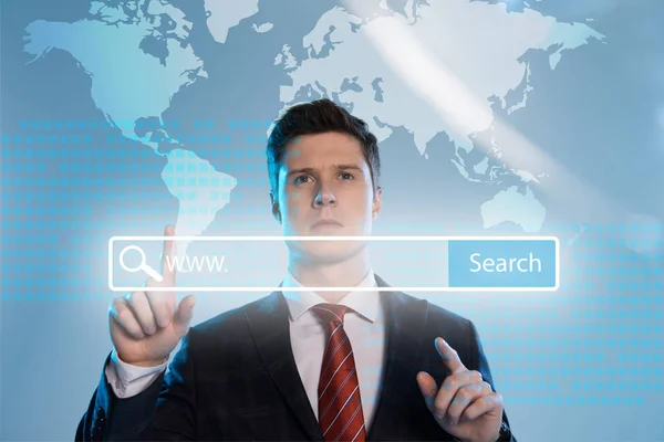 Handsome Businessman Suit Pointing Finger Search Bar Front Blue Background — Stock Photo, Image