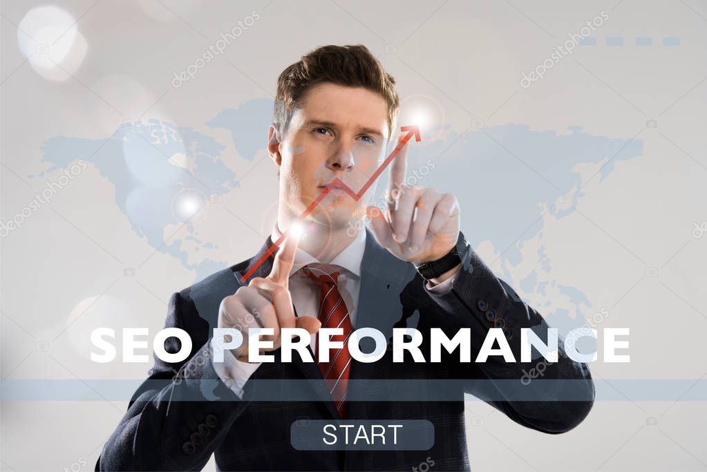 Handsome businessman in suit pointing with fingers at cyber security illustration in front
