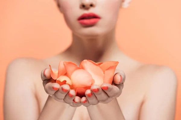 Cropped View Woman Holding Rese Petals Hands Isolated Coral — Stock Photo, Image