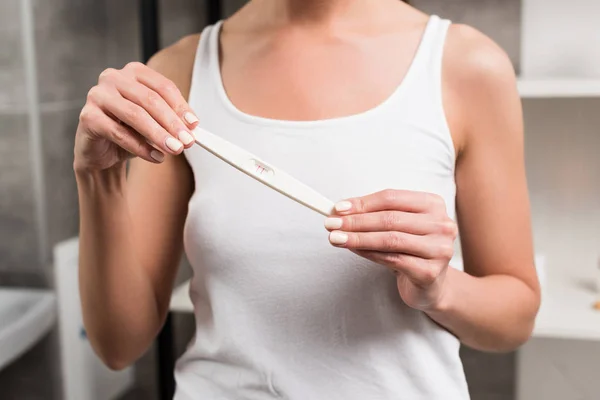 Cropped View Woman Holding Pregnancy Test While Standing Bathroom — Stock Photo, Image