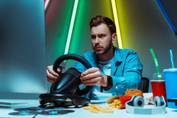 Selective Focus Cyber Sportsman Playing Video Game Steering Wheel — Stock Photo, Image