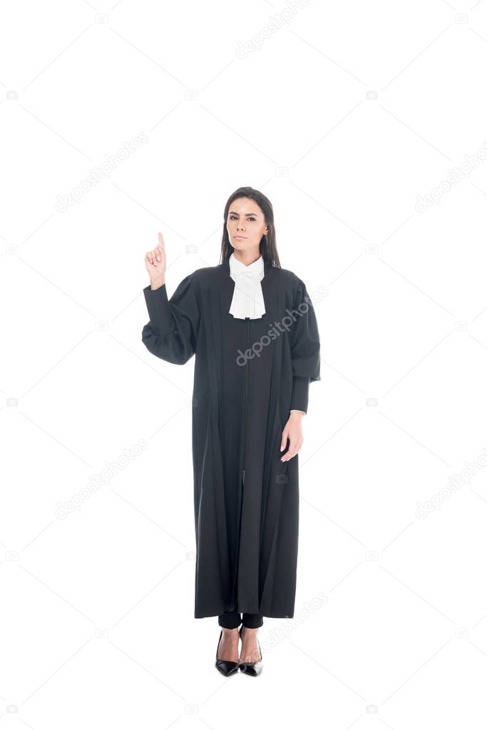Full length view of judge in judicial robe showing idea gesture isolated on white