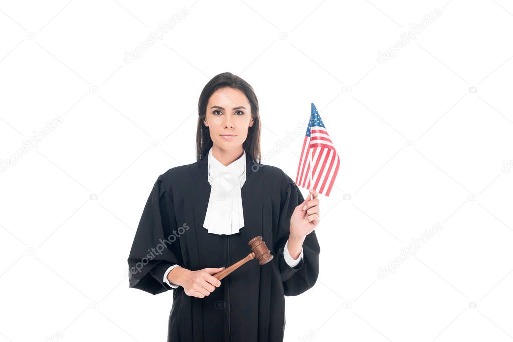 Judge holding gavel and american flag isolated on white