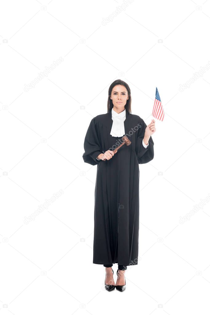 Judge holding gavel and american flag isolated on white