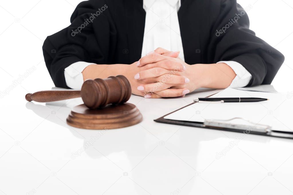 Cropped view of judge with clipboard and wooden gavel isolated on white