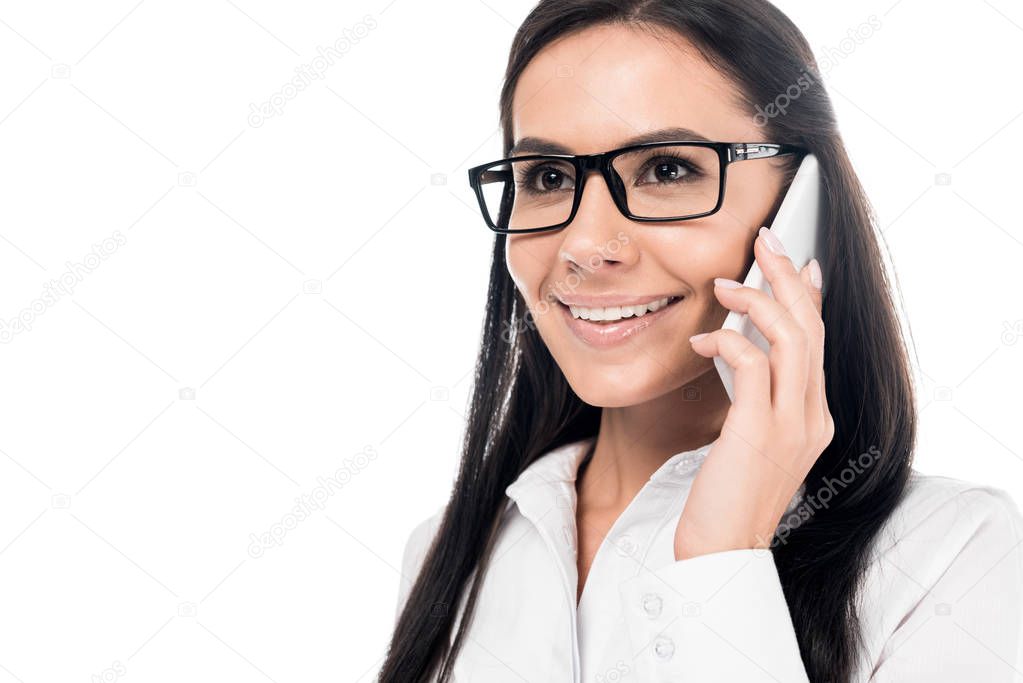 Smiling businesswoman in glasses talking on smartphone isolated on white