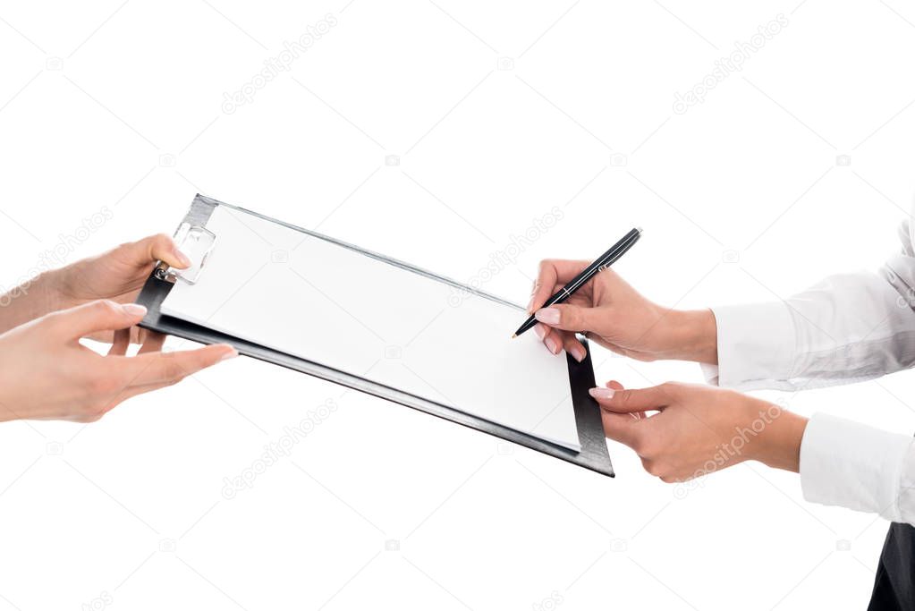 Cropped view of businesswoman signing contract isolated on white