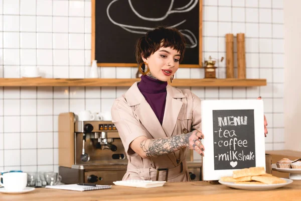 Smiling Businesswoman Placing Menu Board Bar Counter Coffee Shop — Stock Photo, Image