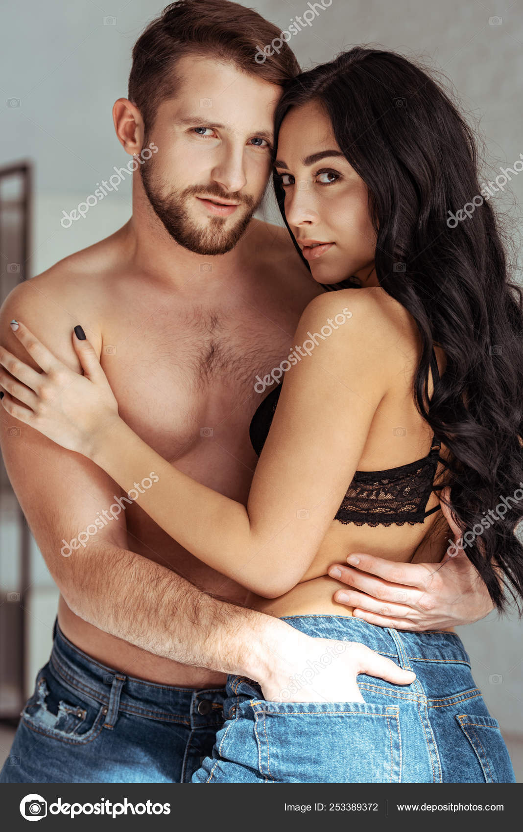 Handsome Muscular Man Hugging Beautiful Woman Bra Looking Camera Stock  Photo by ©IgorVetushko 253389372