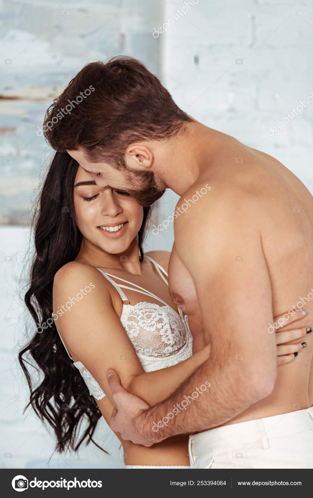 Hot Sexy Boyfriend Girlfriend Hugging Smiling Bedroom Stock Photo by  ©IgorVetushko 253394064