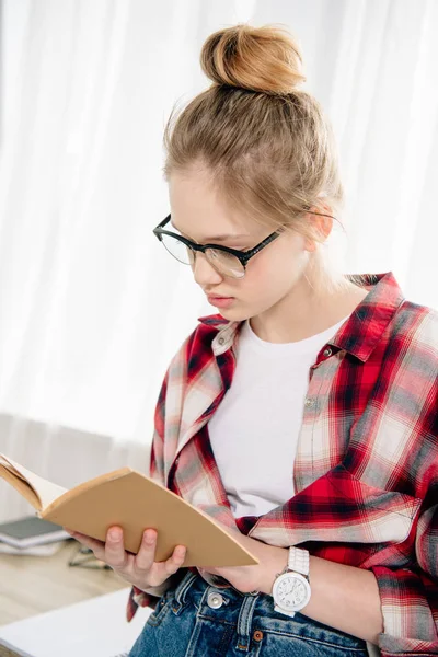 Curious Teenage Kid Glasses Checkered Shirt Reading Book — Stock Photo, Image