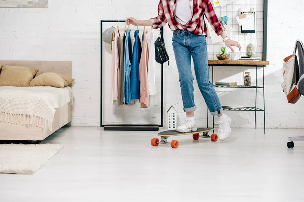 Cropped View Teenager Jeans Checkered Shirt Standing Longboard Bedroom — Stock Photo, Image