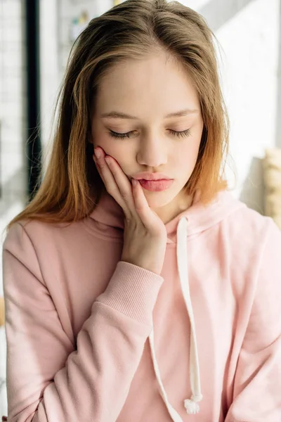 Tired Teenage Kid Pink Hoodie Touching Face Closed Eyes — Stock Photo, Image