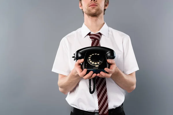 Обрізаний Вид Бізнесмена Тримає Старовинний Телефон Сірому Фоні — стокове фото