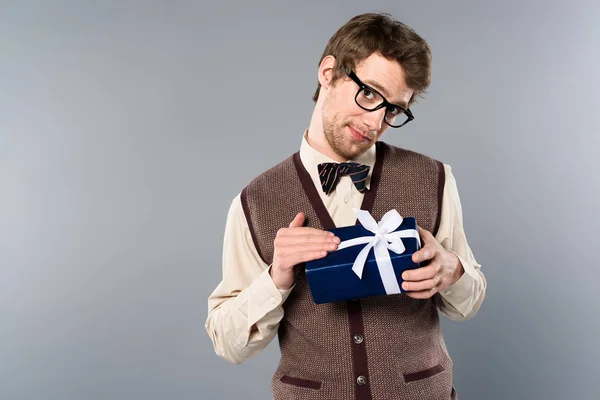 Funny Man Glasses Holding Gift Box Grey Background — Stock Photo, Image