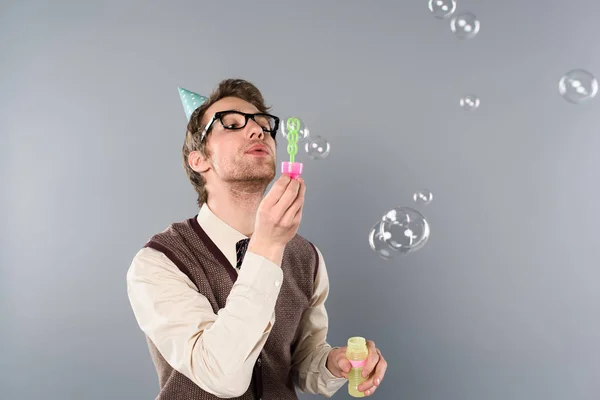 Adult Man Vintage Clothing Party Cap Blowing Soap Bubbles Grey — Stock Photo, Image