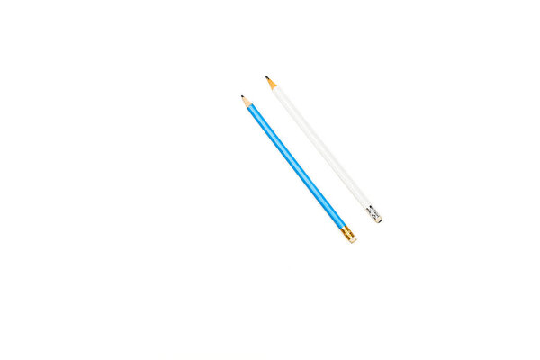 Top view of white and blue pencils isolated on white