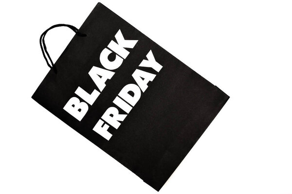 Top view of black friday shopping bag isolated on white