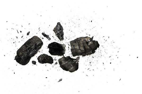 Top view of black burnt firewood isolated on white