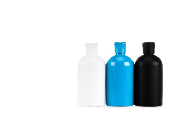 Tři Barevné Kosmetické Láhve Zátky Izolované Bílém — Stock fotografie