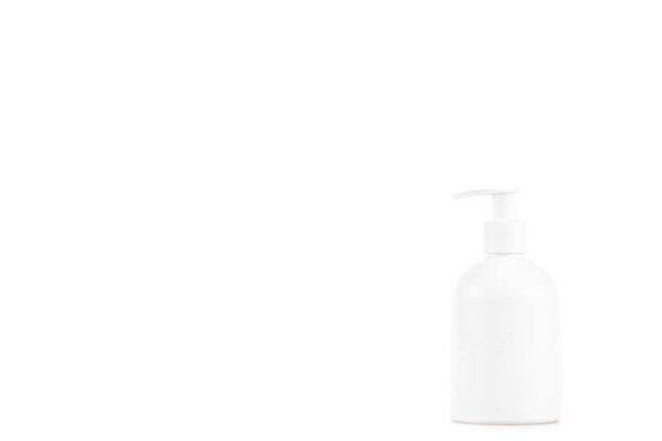 White cosmetic bottle with spray isolated on white