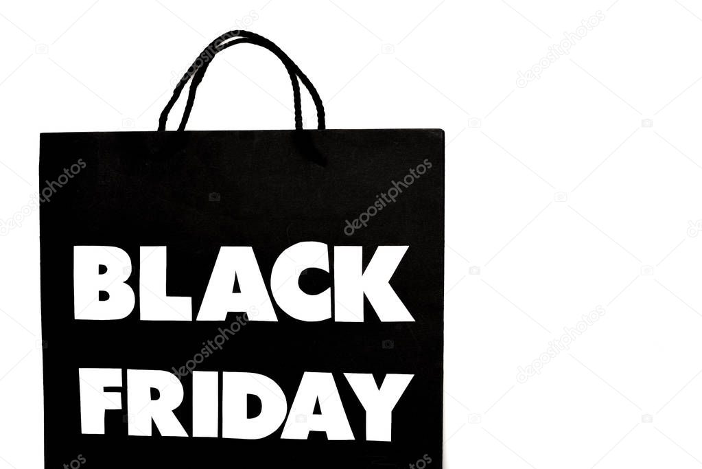 Top view of black friday shopping bag isolated on white